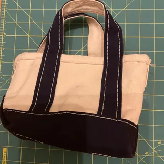Photo of  VINTAGE MINI L.L. BEAN BOAT AND TOTE