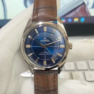 Photo of Vintage 1975 Roamer Manual Mens Silver Watch W/Leather Strap & Blue accents