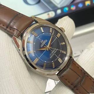 Photo of Vintage 1975 Roamer Manual Mens Silver Watch W/Leather Strap & Blue accents
