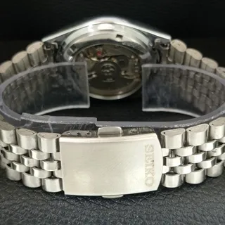 Photo of Vintage 1985 Seiko Automatic Mens Silver Watch W/daydate & Black accents