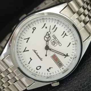 Photo of Vintage 1985 Seiko Automatic Mens Silver Watch W/daydate & Black accents