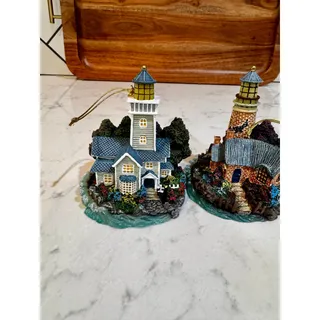 Photo of Thomas Kinkade Lighthouse Collection miniature illuminated lighthouse ornaments