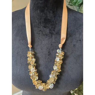 Photo of Gold Tone Crystal Beaded Ribbon Statement Necklace