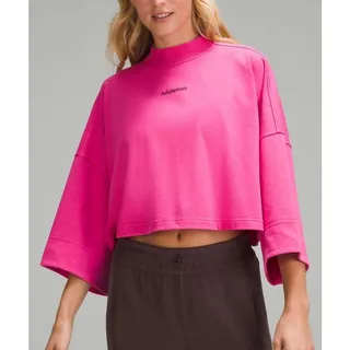 Photo of Lululemon Heavyweight Cropped Mock Neck Top Size M/L Pink Wordmark Athleisure
