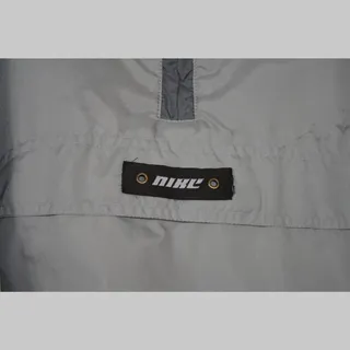 Photo of Vintage 90s Nike Youth Large Gray Anorak Windbreaker Sleeve Spellout
