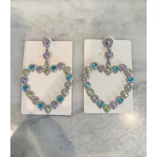 Photo of Taylor Swift Love Heart Hoop Earrings inspired by the earrings made by Anabel Chan