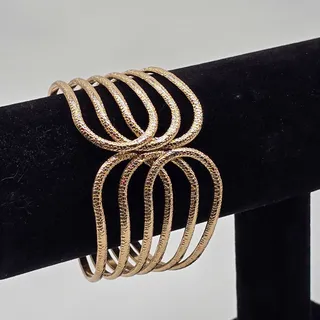 Photo of Front Open Gold Tone Textured Metal Hinged Fashion Wide Cuff Bracelet