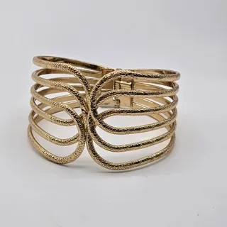 Photo of Front Open Gold Tone Textured Metal Hinged Fashion Wide Cuff Bracelet