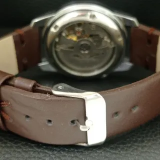 Photo of Vintage 1971 Seiko Automatic Mens Silver Watch W/daydate & Brown accents