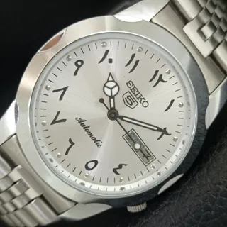 Photo of Vintage 1983 Seiko Automatic Mens Silver Watch W/daydate & Black accents