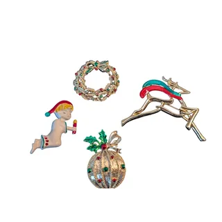 Photo of Lot of Four Vintage Signed Christmas Themed Pins