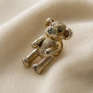 Photo of Vintage Teddy Bear Lapel Pin | 1980s/90s Metallic Gold Tone Articulated