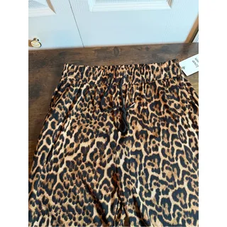 Photo of Love Poem NWT Leopard Print Flare Pants & Ribbed Crop Top Set Size L M/L