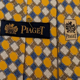 Photo of NWOT Vintage Piaget 100% Silk Men's Yellow Tie With Multicolor Geometric Designs