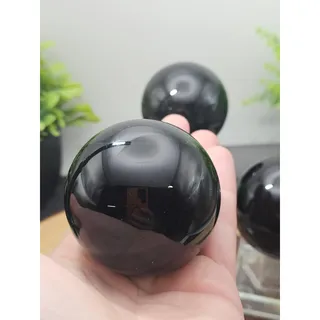 Photo of Volcanic Obsidian Spheres 50-60mm with Stand – Polished Shine Home Decor