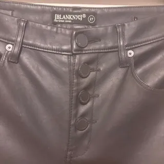 Photo of Black leather skinny pants