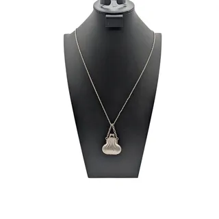 Photo of Catherine Popesco La Vie LVP France Parisienne Purse Necklace